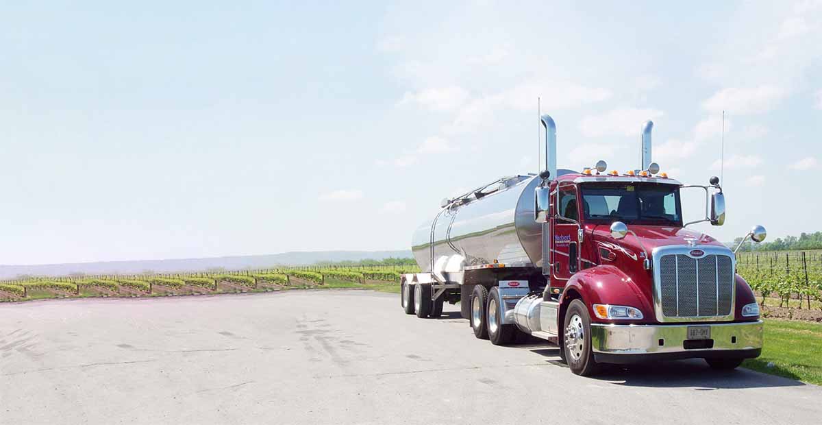 A fuel tanker truck equipped with Solemn Fleetman tracker and other technologies.